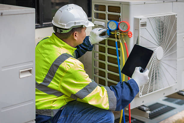 Professional Air Duct Cleaning technician working in Oakley, CA